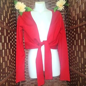 New takeout red sweater that is tied at the chest with long sleeves